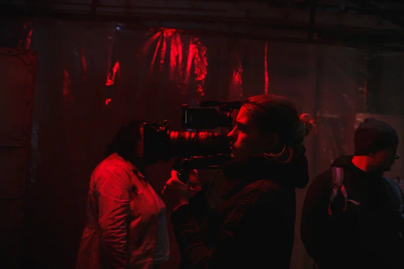 A member of the staff, filming the the music video for "Sinking" by Enei